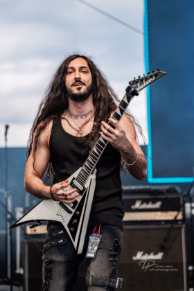 A picture of Risen From Ashes in concert taken by Iuliana Pasca